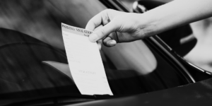 Parking ticket placed on car